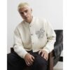 Ame Saint Brushback Bomber Jacket in Cream